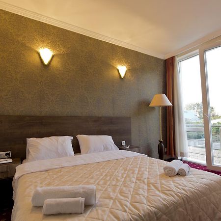 Orange Hotel Gonio Bagian luar foto